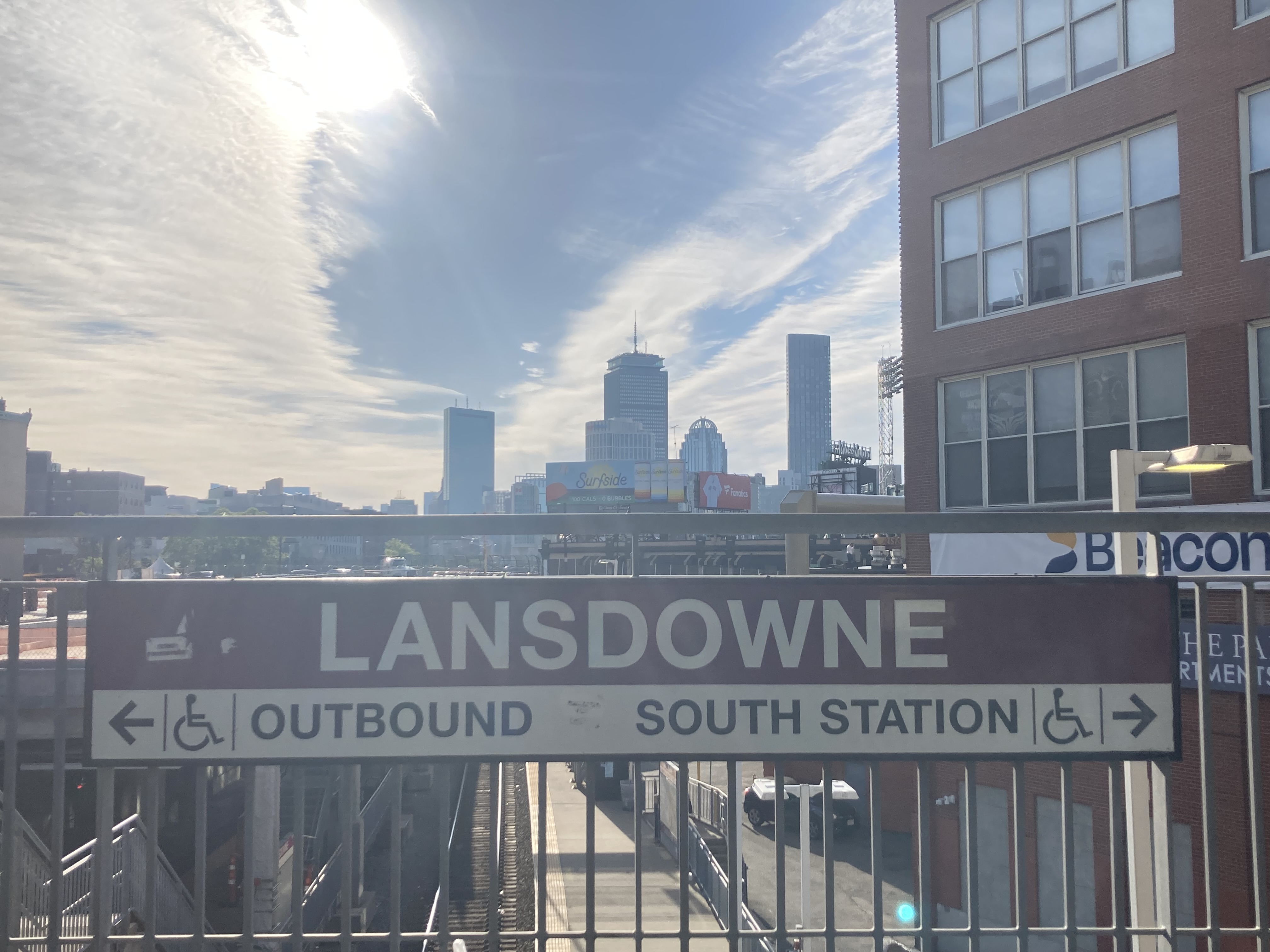 Lansdowne station sign and the Boston skyline.
