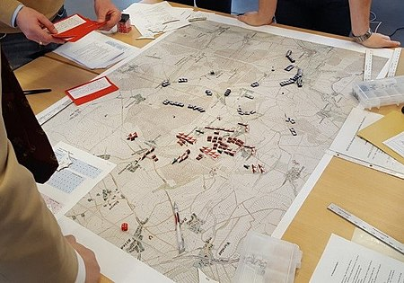 A Kriegsspiel match in progress. Taken from Wikipedia.